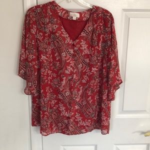 Brand new, never worn. Flutter sleeve blouse.